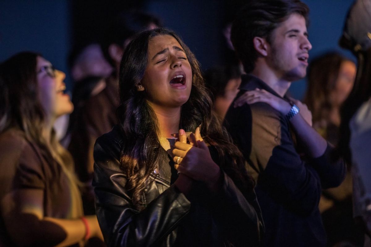 Young woman worshipping