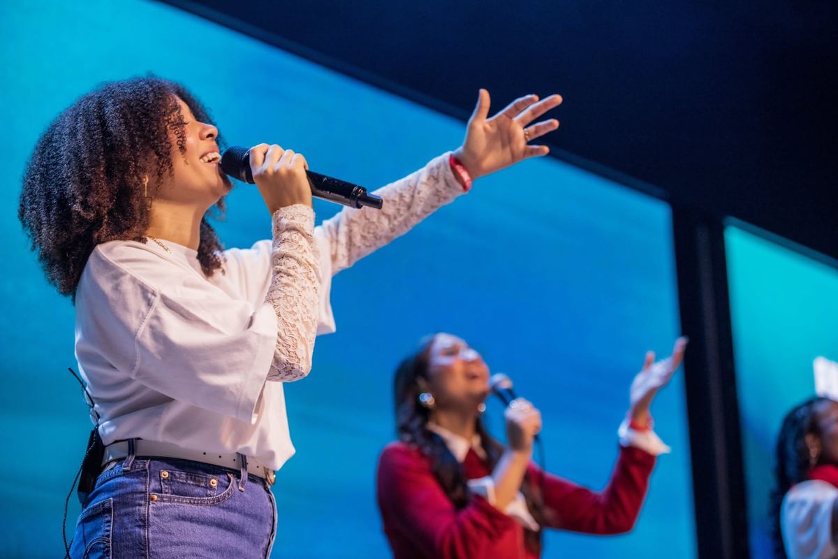 Worship leader singing